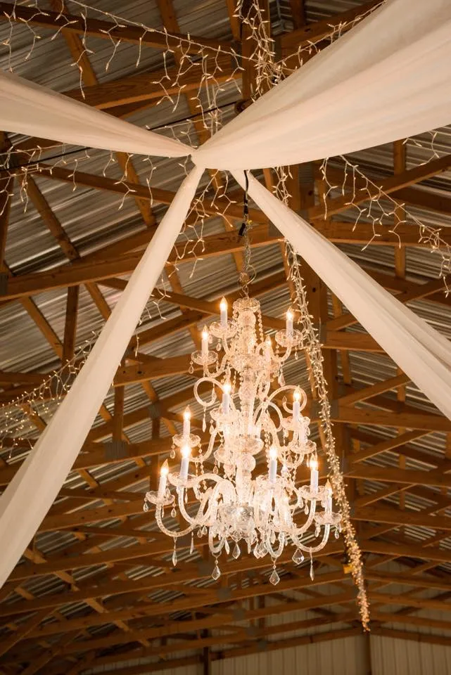 Chandelier lighting inside barn